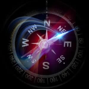 Uma imagem de uma bússola com alguns efeitos de luzes, indicando planejamento e direcionamento de caminhos e tomada de decisão, fazendo alusão ao trabalho feito pela Afterpix.